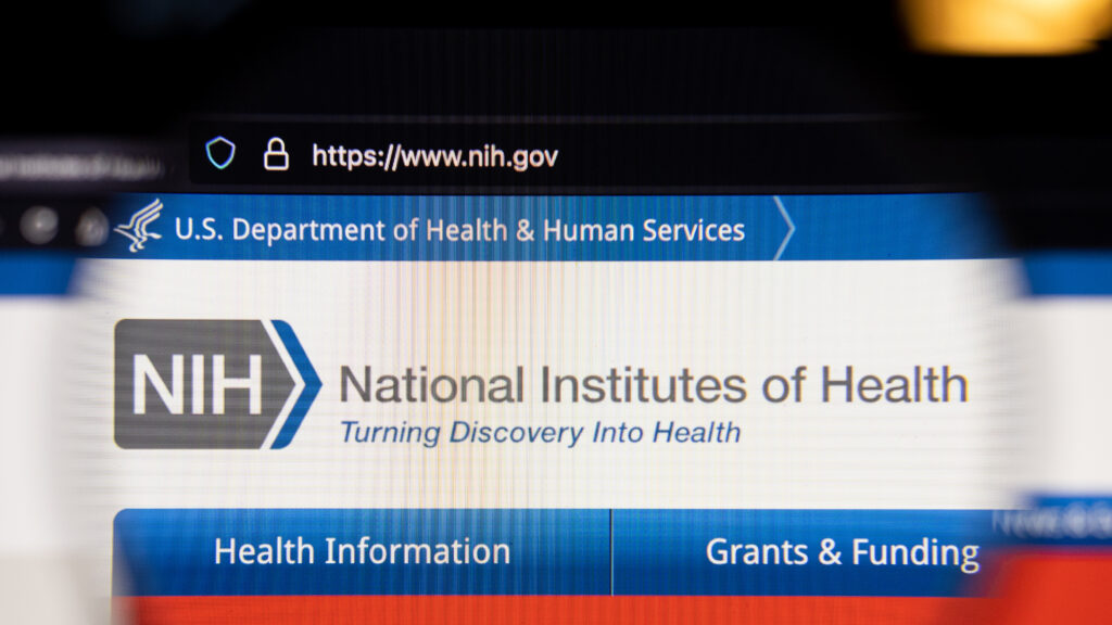 Gavel and legal documents representing lawsuit over NIH funding cuts