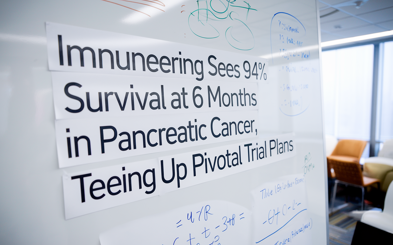 A depiction of cancer cells being targeted by medical crosshairs