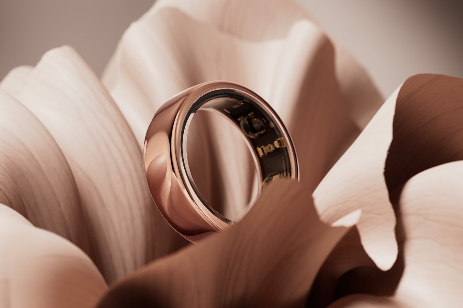 A sleek smart ring tracking health and wellness