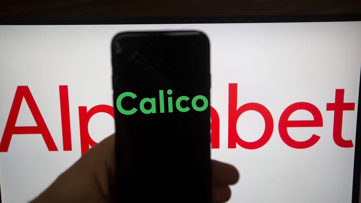 A vial of medicine with a broken hourglass in the background symbolizing challenges in anti-aging research