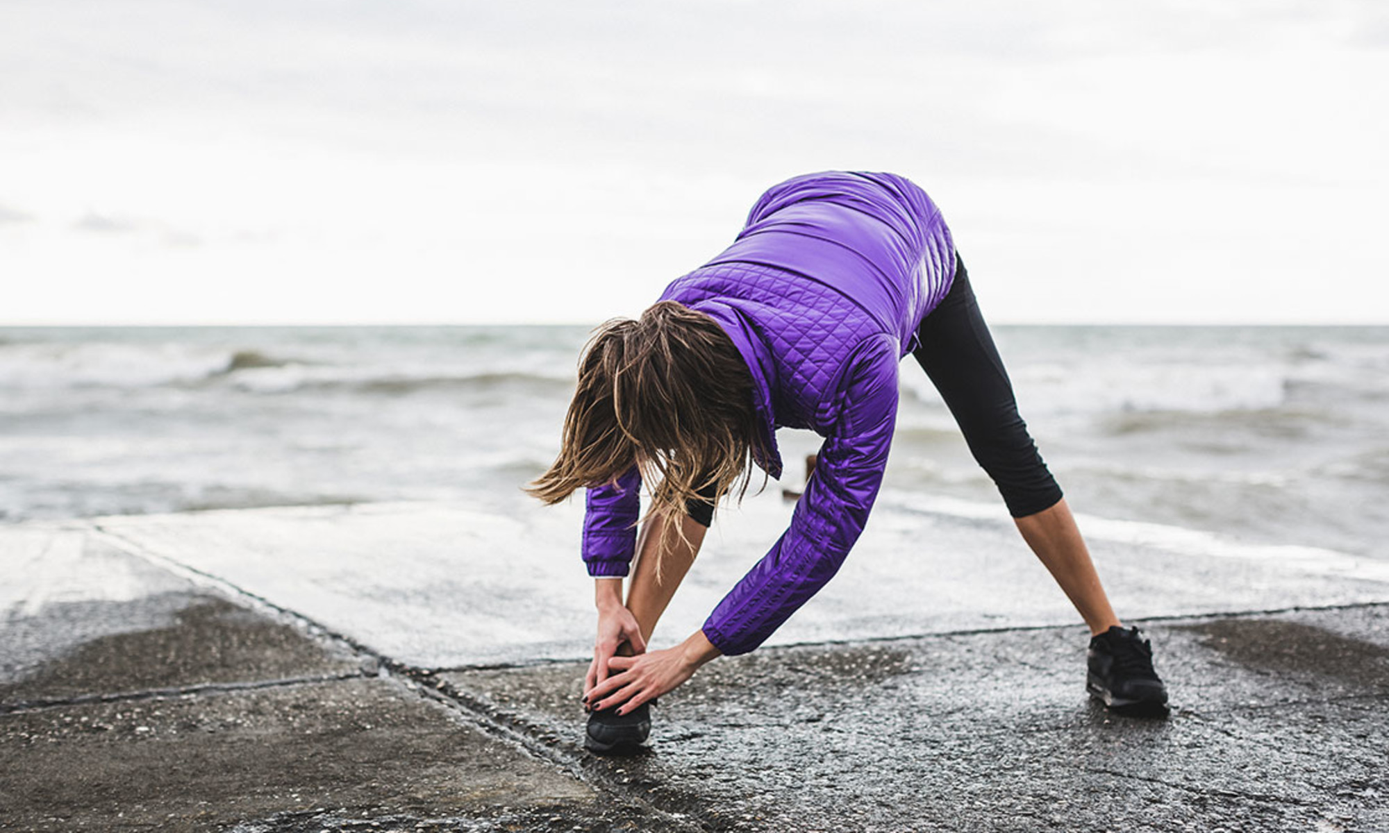 Person climbing stairs representing steps to longevity