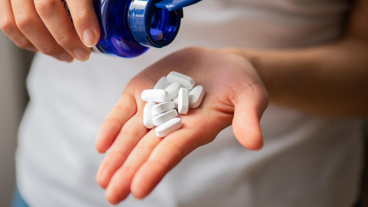 A depiction of NAD+ molecules enhancing cellular vitality and energy, symbolizing anti-aging