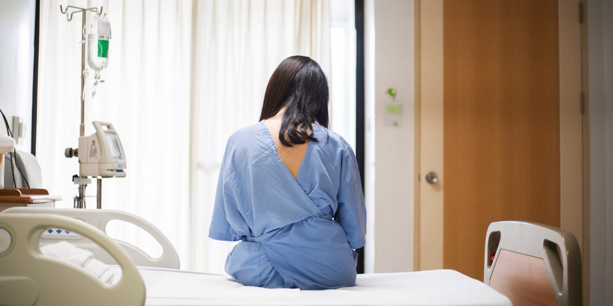 Young woman embracing a healthier lifestyle with fruits and vegetables