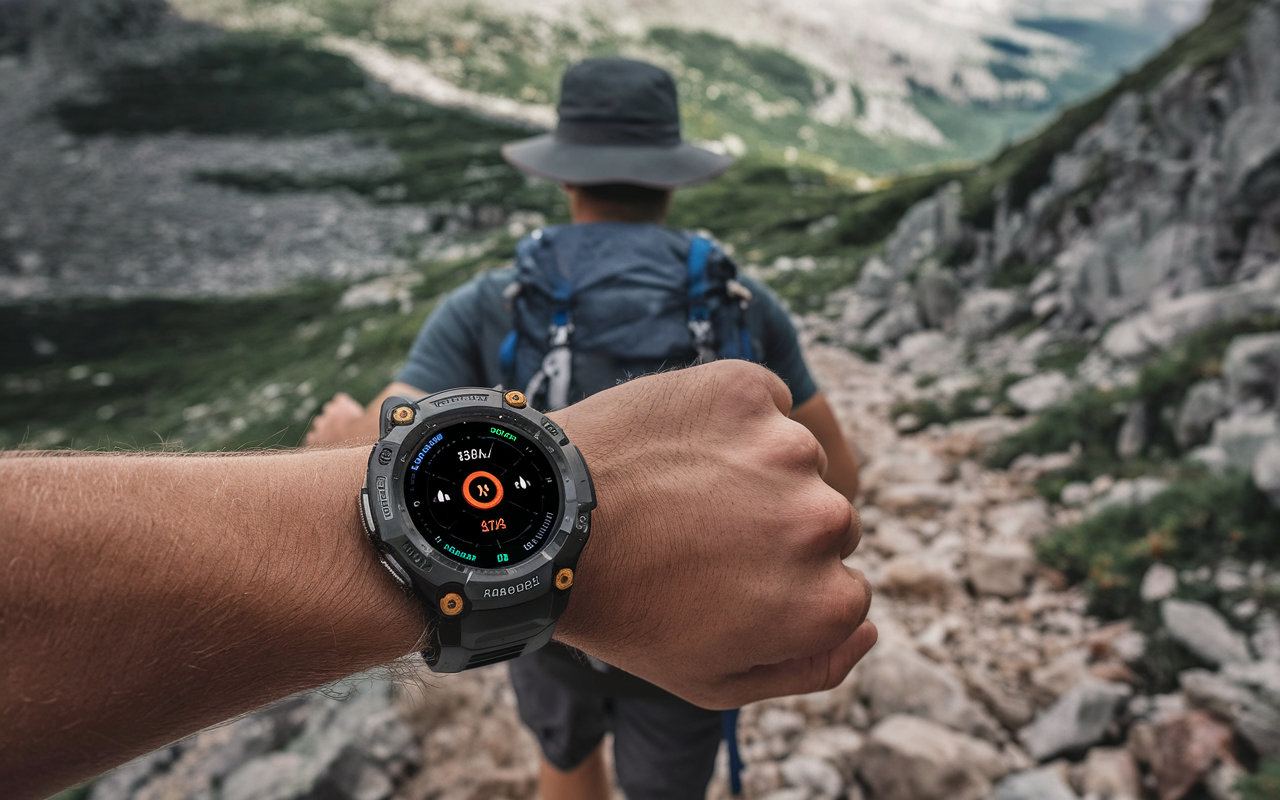 Rugged smartwatch displaying GPS navigation on a mountain trail